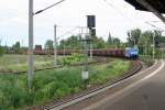 185 511 der HLG mit einem leeren Holzzug in Richtung Groheringen (Weienfels, 27.05.2011)